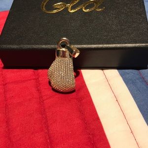Iced out boxing glove pendant